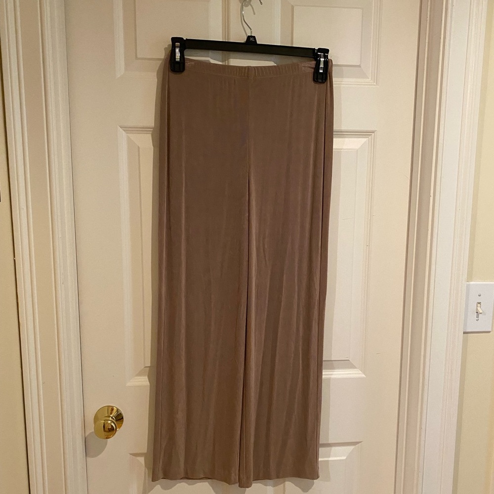 Womens Chico Travelleds  tan pants.  Worn once by my mom.  Size 0